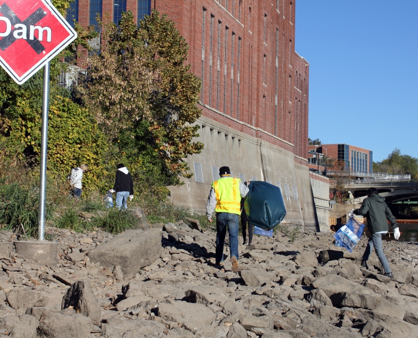 Volunteers help clean up the Iowa River.