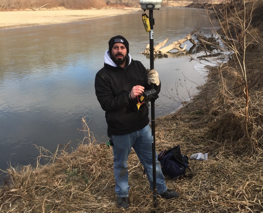 Danny Moustakidis, Turkey River Watershed. Standing in front of a river