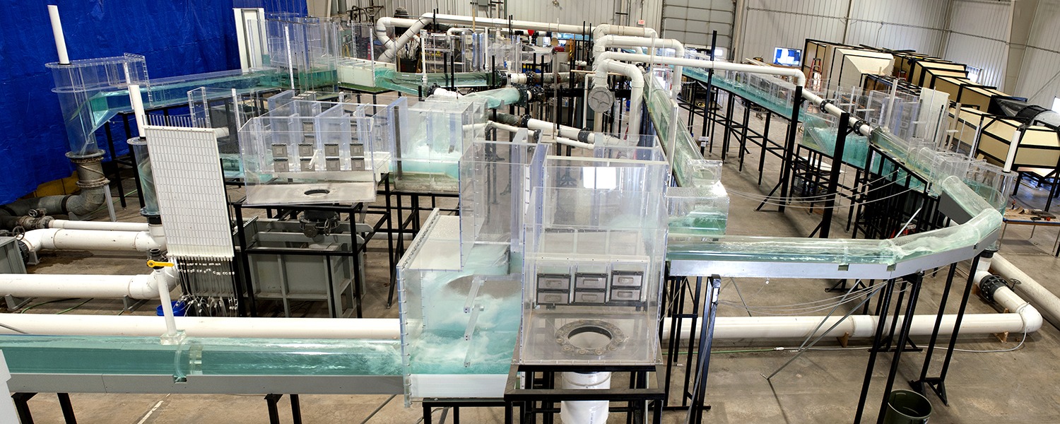 Water flows through a massive, warehouse-sized model of a portion of the London sewer system